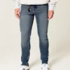 Αθλητικό skinny τζιν με μέτριο πλύσιμο Αθλητικό skinny τζιν με μέτριο πλύσιμο