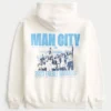 Χαλαρή μπλούζα με κουκούλα και σχέδιο Manchester City Χαλαρή μπλούζα με κουκούλα και σχέδιο Manchester City