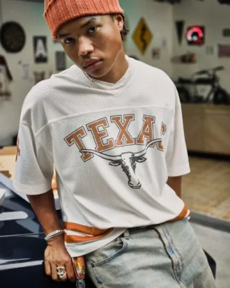 Φανέλα ποδοσφαίρου με γραφικά Longhorns του Πανεπιστημίου του Τέξας στο Ώστιν