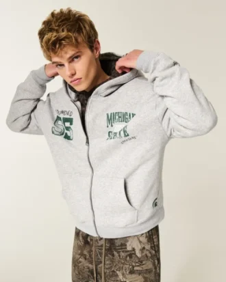 Φαρδιά φούτερ με κουκούλα και φερμουάρ Michigan State University Spartans Graphic Hoodie Φαρδιά φούτερ με κουκούλα και φερμουάρ Michigan State University Spartans Graphic Hoodie