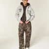 Φαρδιά φούτερ με κουκούλα και φερμουάρ Michigan State University Spartans Graphic Hoodie Φαρδιά φούτερ με κουκούλα και φερμουάρ Michigan State University Spartans Graphic Hoodie