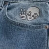 Μέτρια πλύση Alien Graphic Baggy Jeans Μέτρια πλύση Alien Graphic Baggy Jeans