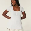 Μπλούζα Henley Babydoll με κοντά μανίκια