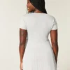 Μπλούζα Henley Babydoll με κοντά μανίκια