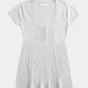 Μπλούζα Henley Babydoll με κοντά μανίκια