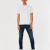 Σκούρο πλυμένο αθλητικό skinny τζιν