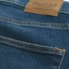 Σκούρο πλυμένο αθλητικό skinny τζιν Σκούρο πλυμένο αθλητικό skinny τζιν