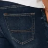 Σκούρο πλυμένο αθλητικό skinny τζιν