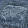 Σορτς τζιν με γραφικό Eagle σε πολύ φαρδιά γραμμή Σορτς τζιν με γραφικό Eagle σε πολύ φαρδιά γραμμή
