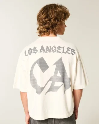 Βαρύ, φαρδύ, κοντό T-shirt με γραφικό ποδοσφαίρου Los Angeles Βαρύ, φαρδύ, κοντό T-shirt με γραφικό ποδοσφαίρου Los Angeles